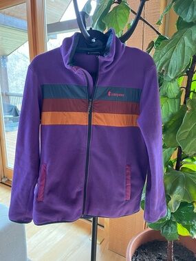 cotopaxi Purple Fleece Jacket with Navy and Orange Stripes